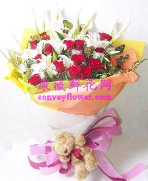 红玫瑰19枝，4枝多头白色香水百合，绿叶搭配，手柔纸包装，送小熊一只